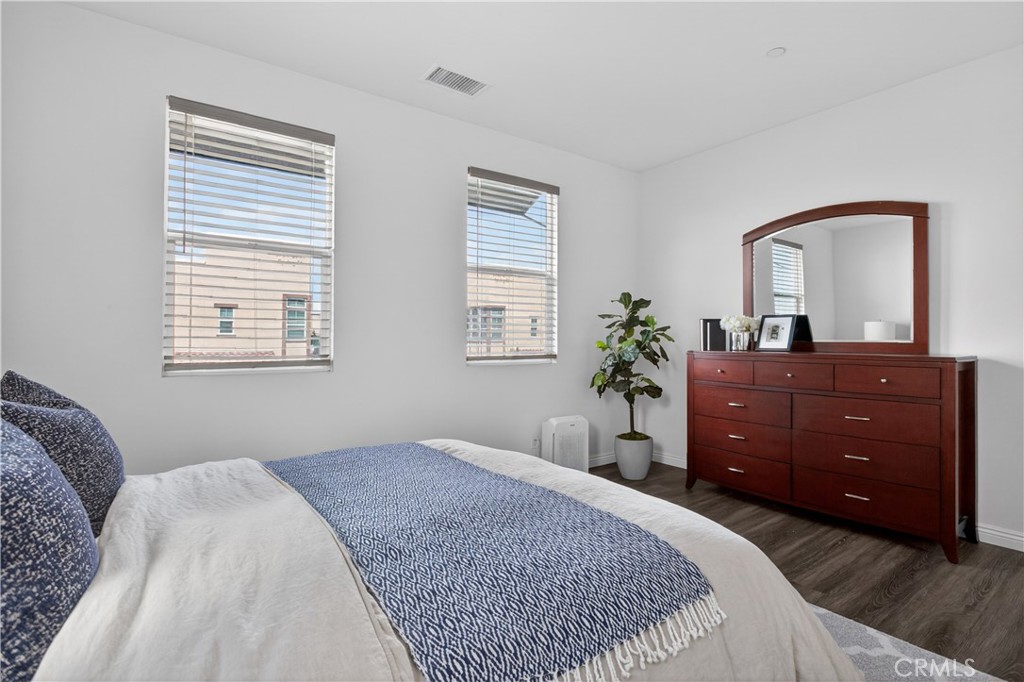 5796 Spring Street Buena Park, CA 90621 - Photo 21 of 33 a bedroom with a bed and a dresser