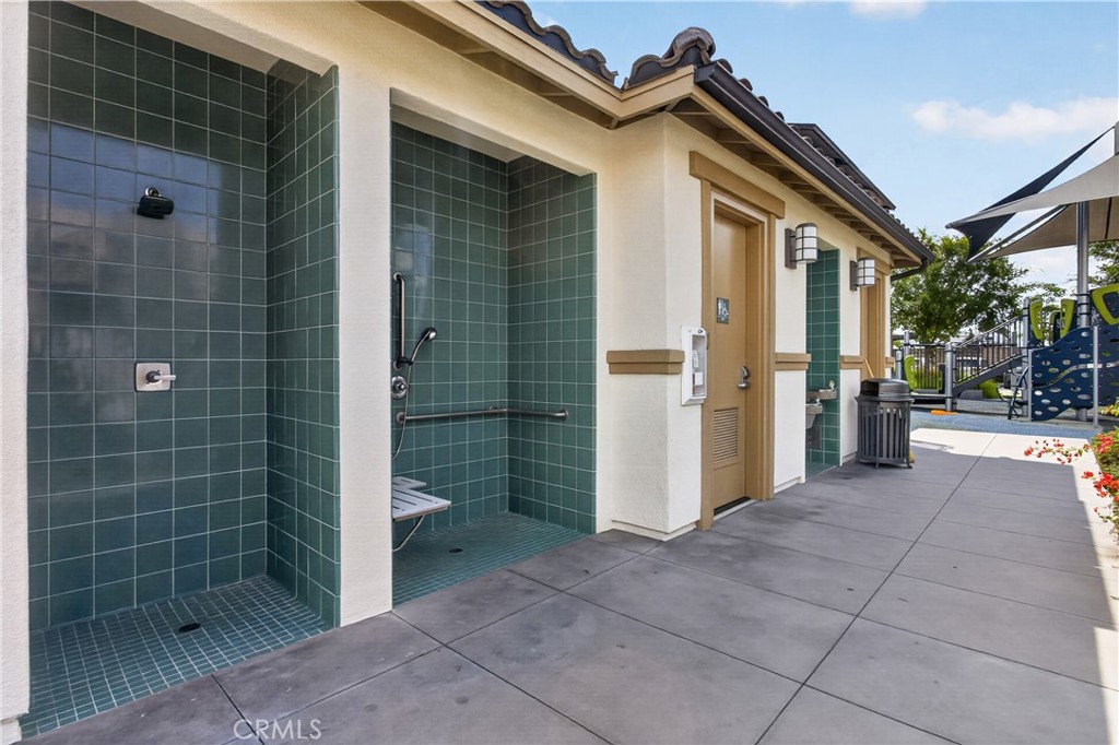 5796 Spring Street Buena Park, CA 90621 - Photo 30 of 33 a view of a bathroom with a glass door shower