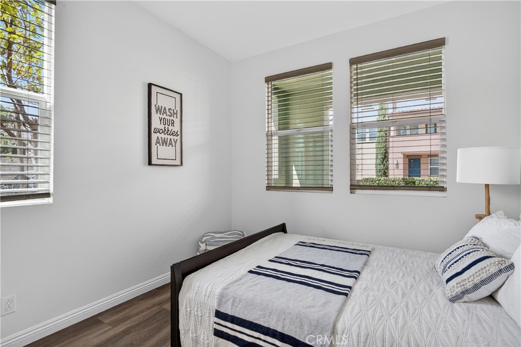 5796 Spring Street Buena Park, CA 90621 - Photo 5 of 33 a bedroom with a bed and a window
