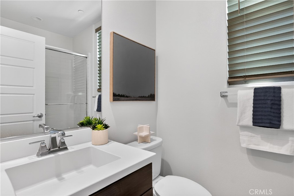 5796 Spring Street Buena Park, CA 90621 - Photo 6 of 33 a bathroom with a sink and a toilet