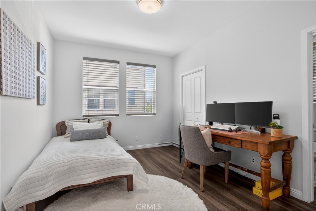 5796 Spring Street Buena Park, CA 90621 - Photo 7 of 33 a bedroom with a bed and a desk