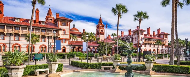 a view of a swimming pool with an ocean view