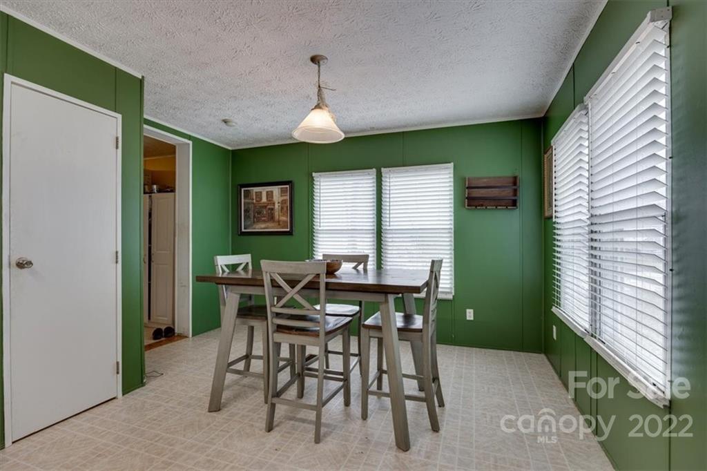 2444 Campbell Lake Road Lancaster, SC 29720 - Photo 11 of 24 a view of a dining room with furniture and a window
