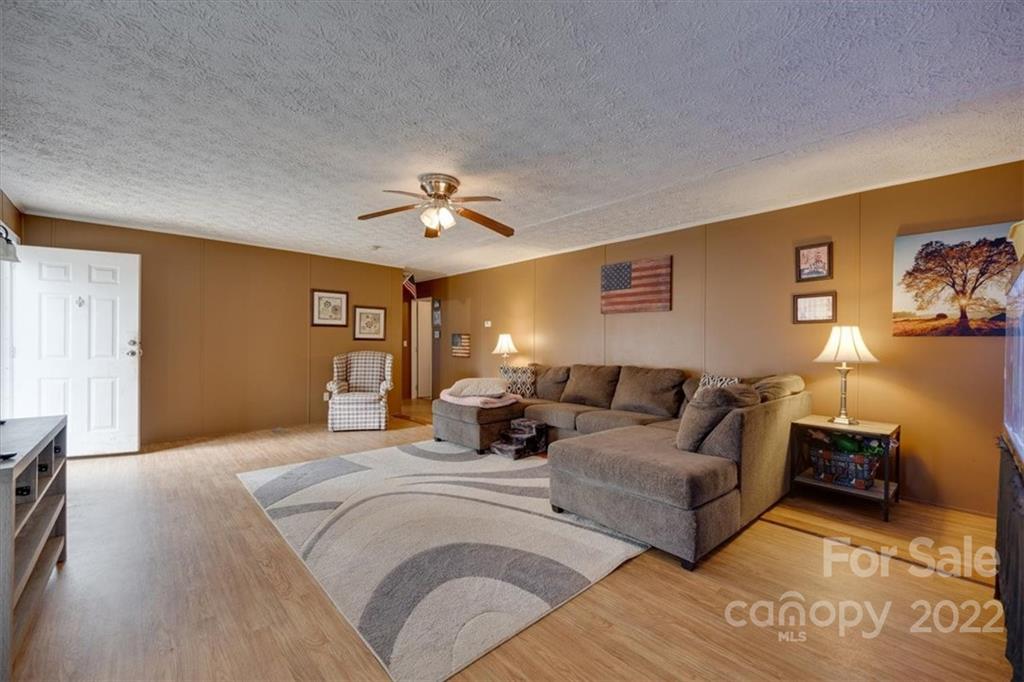 2444 Campbell Lake Road Lancaster, SC 29720 - Photo 6 of 24 a spacious bedroom with a bed and ceiling fan