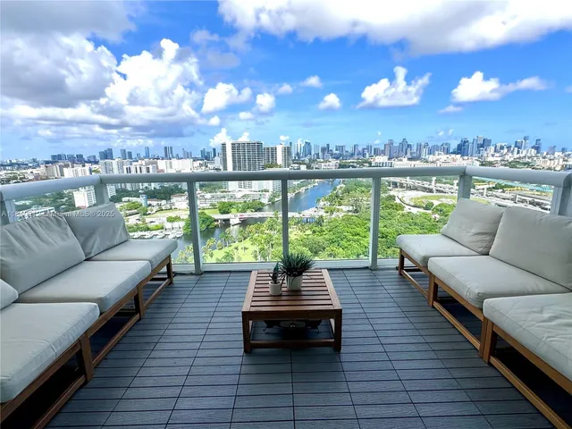 a view of a terrace with couches