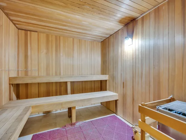 a kitchen with a window and a cabinet