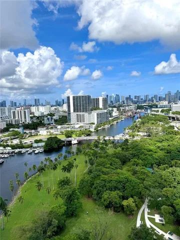 a view of a lake with houses