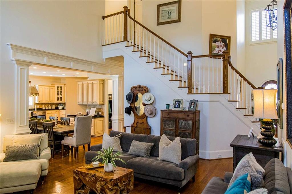 280 Ravenwood Drive Southeast Rome, GA 30161 - Photo 19 of 43 a living room with furniture and a chandelier