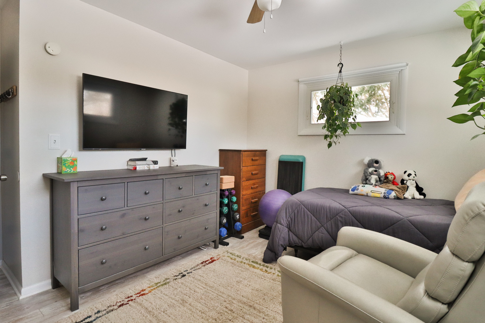 1920 North Washington Street Wheaton, IL 60187 - Photo 21 of 76 a bedroom with a bed and a flat screen tv
