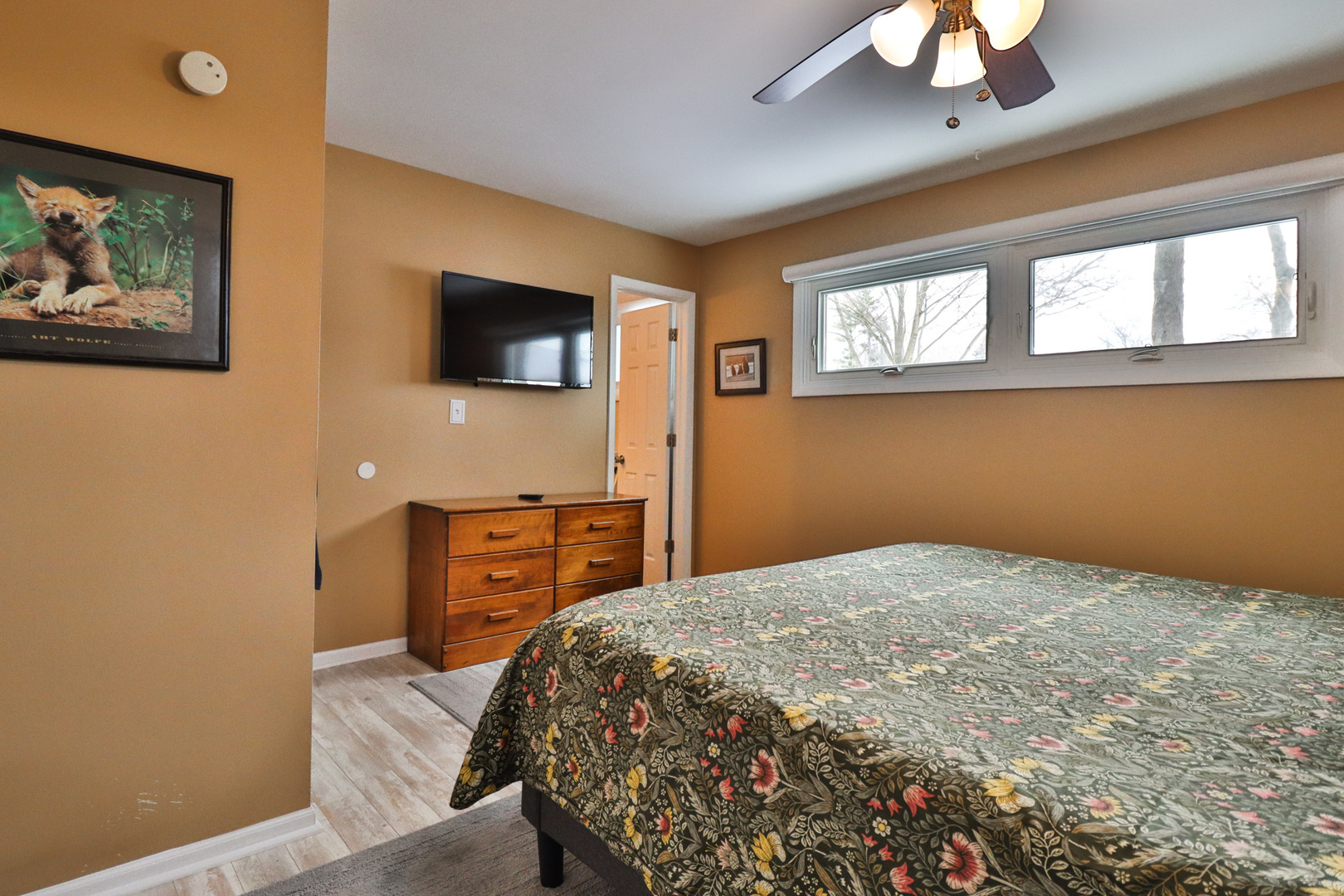 1920 North Washington Street Wheaton, IL 60187 - Photo 25 of 76 a bedroom with a bed and a flat screen tv