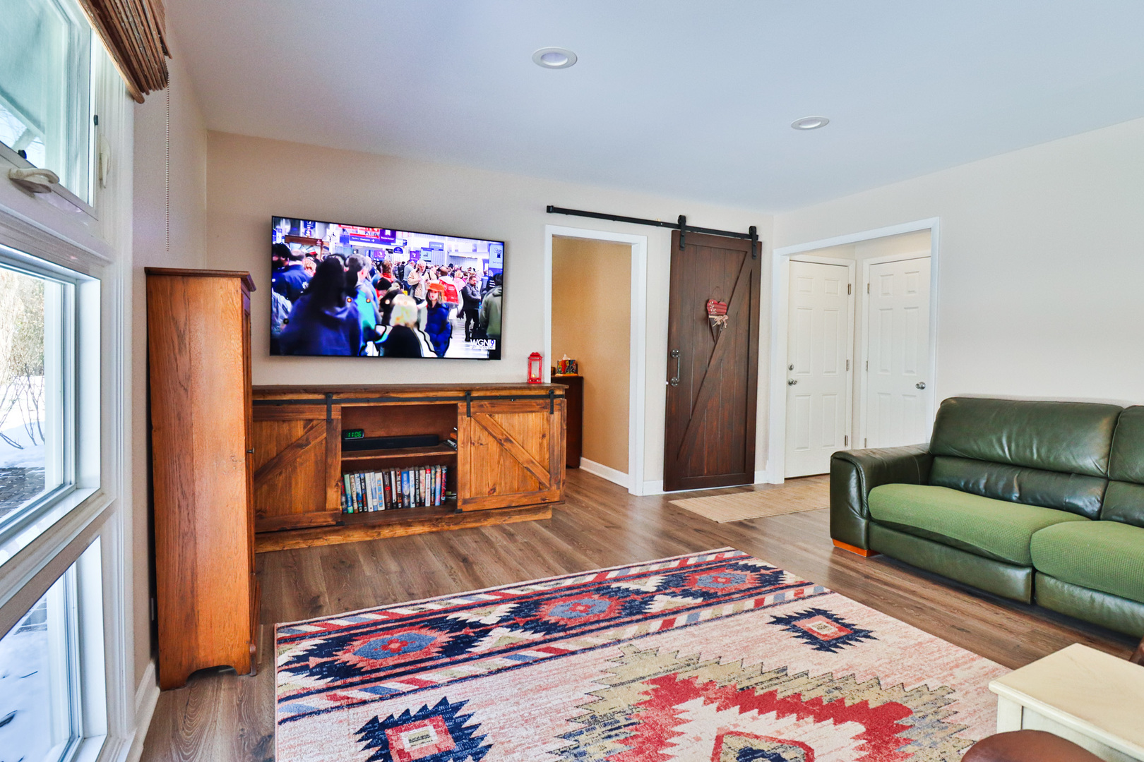 1920 North Washington Street Wheaton, IL 60187 - Photo 33 of 76 a living room with furniture and a flat screen tv