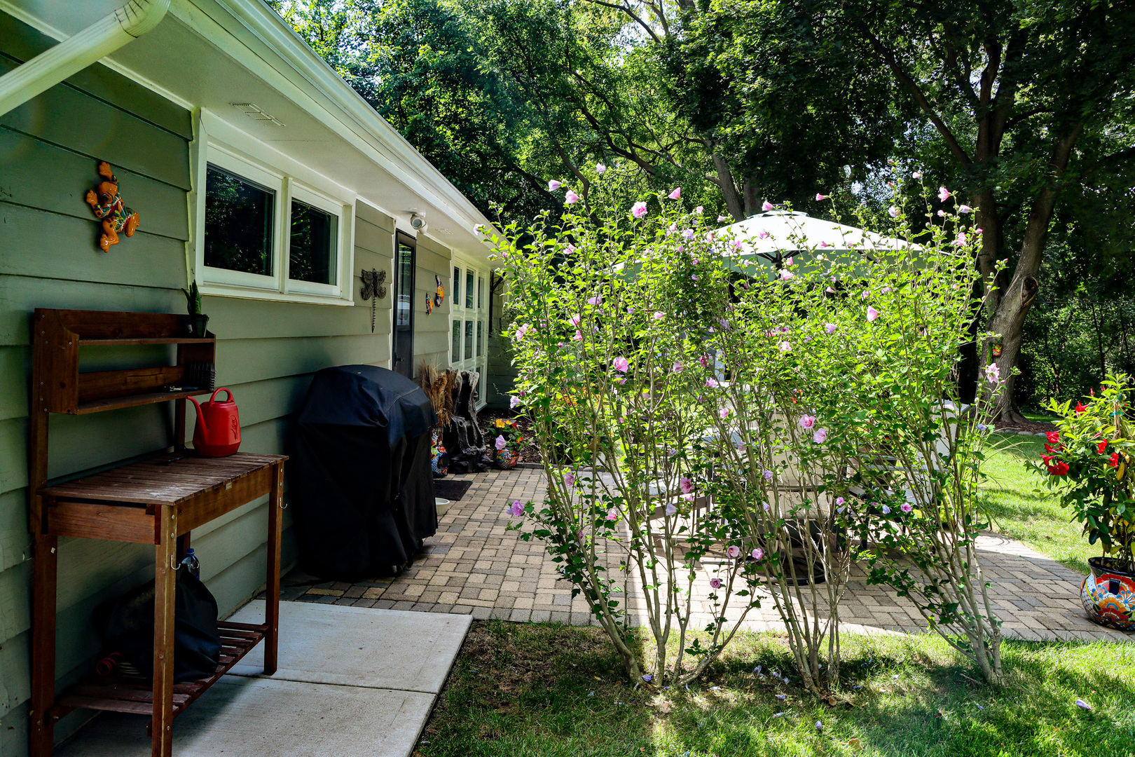 1920 North Washington Street Wheaton, IL 60187 - Photo 42 of 76 a backyard of a house with lots of green space