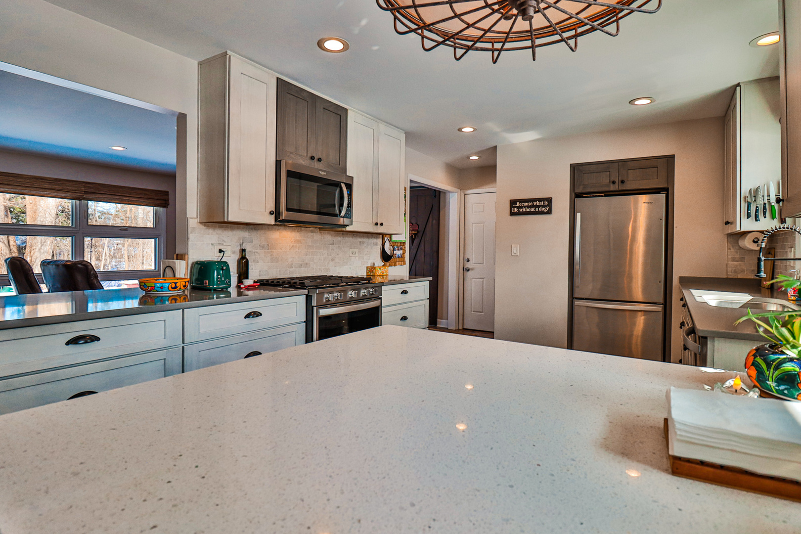1920 North Washington Street Wheaton, IL 60187 - Photo 6 of 76 a kitchen with stainless steel appliances a refrigerator sink microwave and cabinets