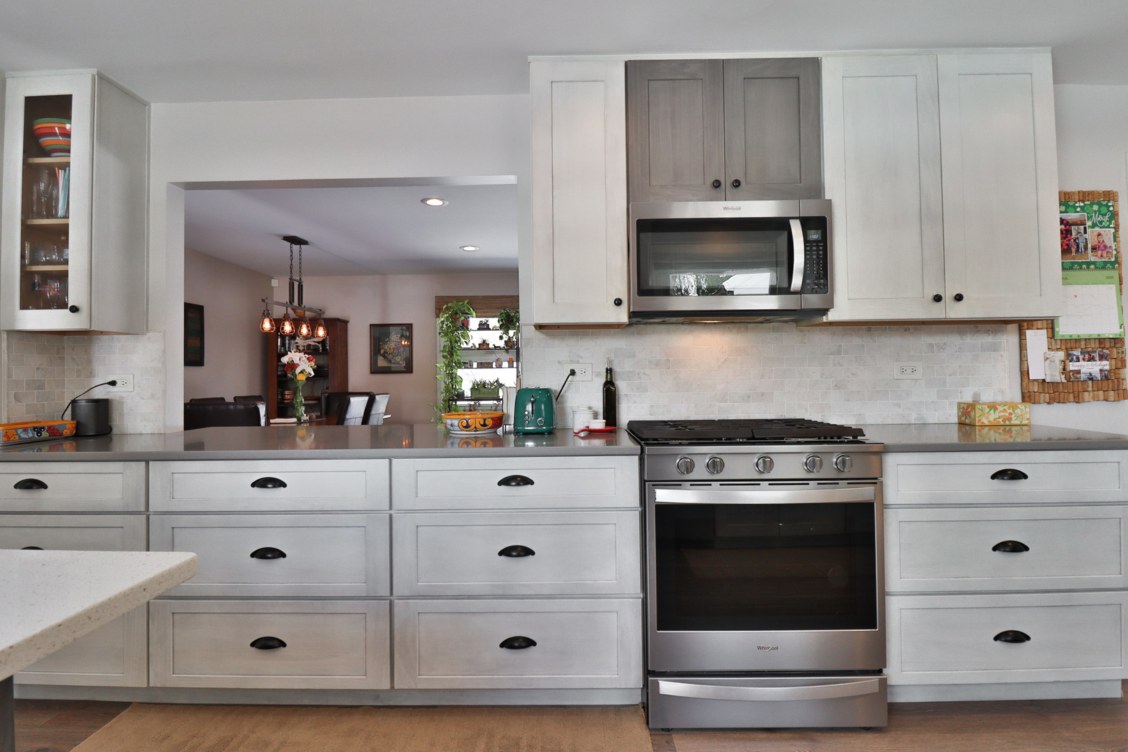 1920 North Washington Street Wheaton, IL 60187 - Photo 9 of 76 a kitchen with stainless steel appliances white cabinets and a stove
