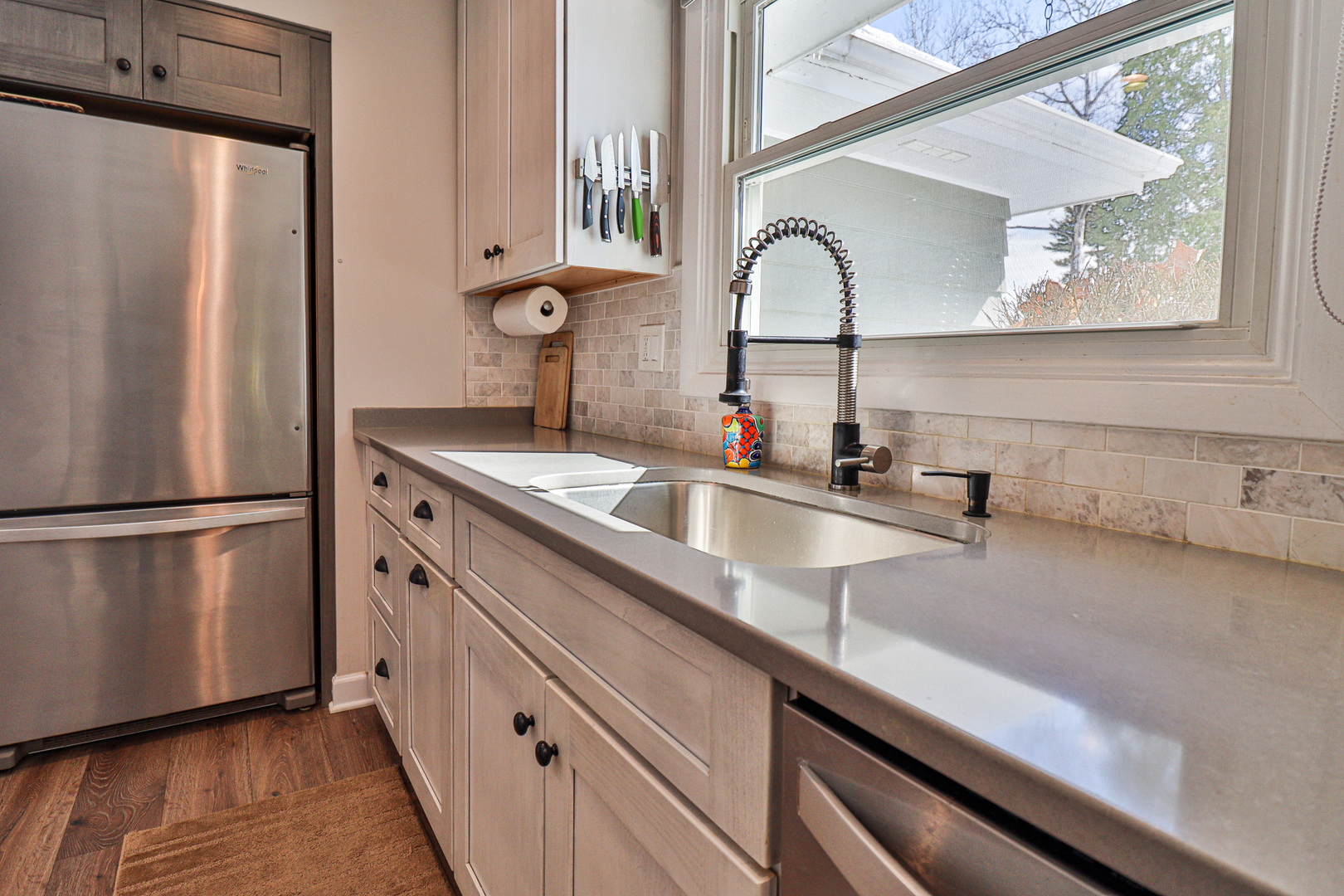1920 North Washington Street Wheaton, IL 60187 - Photo 10 of 76 a kitchen with a refrigerator and a sink