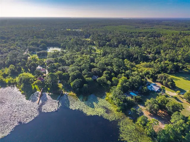 a view of a lake with a house