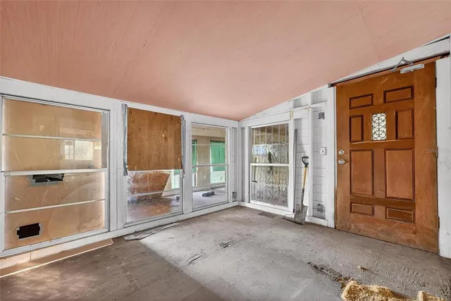 an empty room with windows