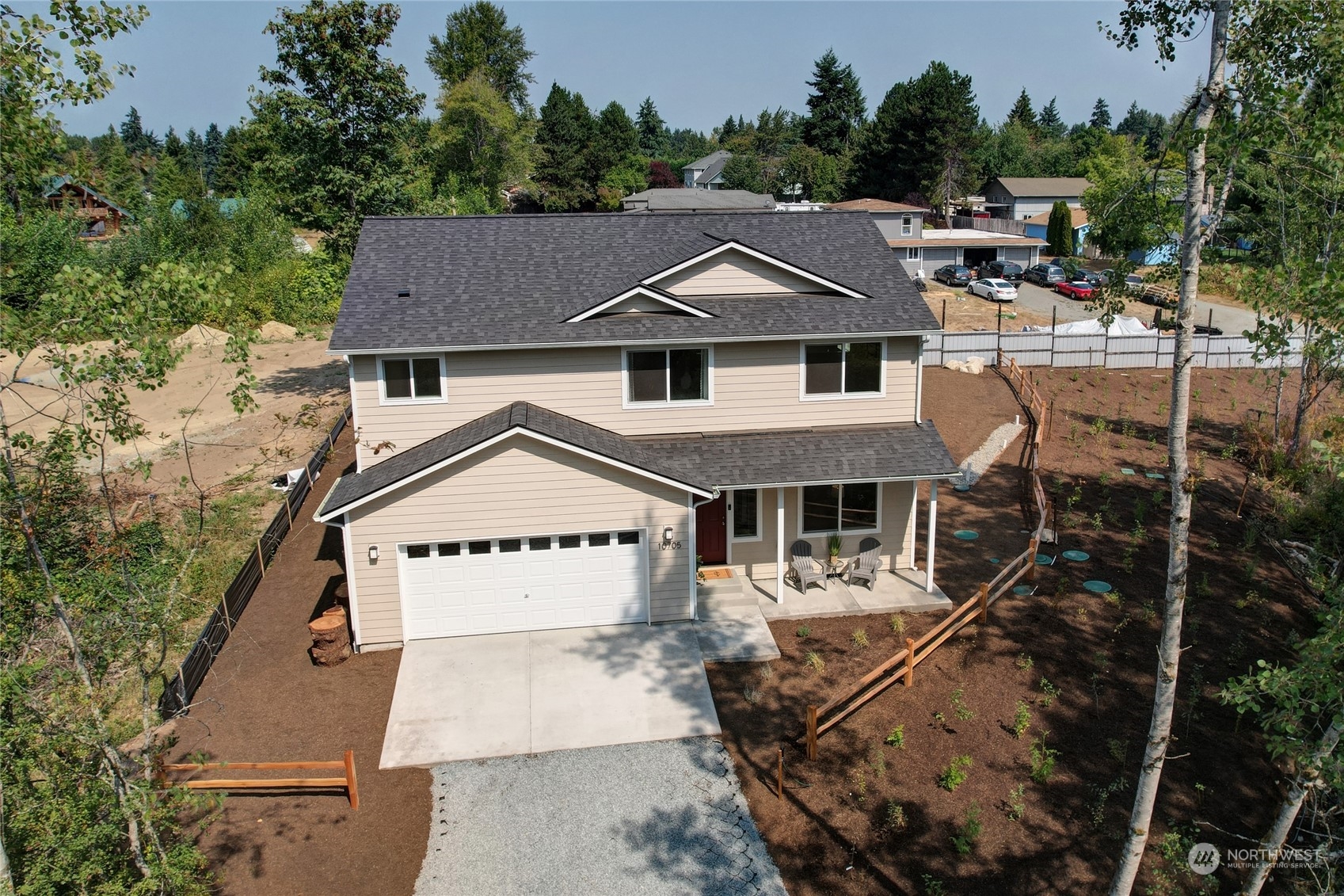 10705 36th Street East Edgewood, WA 98372 - Photo 37 of 40 an aerial view of a house with a yard