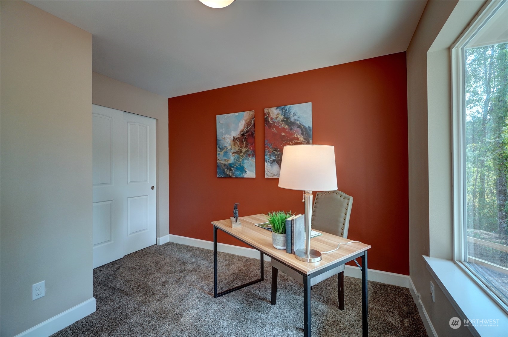 10705 36th Street East Edgewood, WA 98372 - Photo 4 of 40 a room with furniture and window