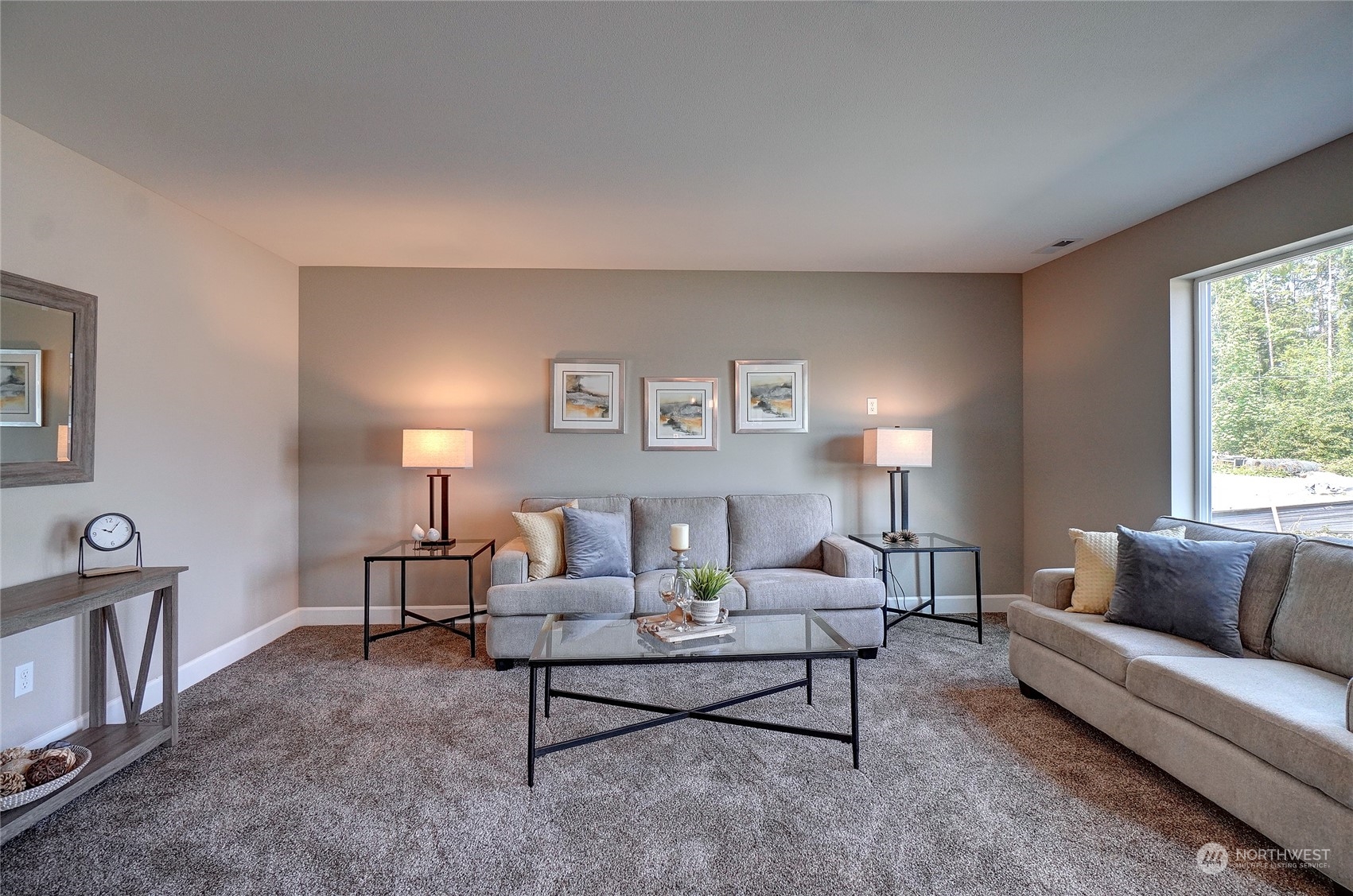 10705 36th Street East Edgewood, WA 98372 - Photo 7 of 40 a living room with furniture and a potted plant on table