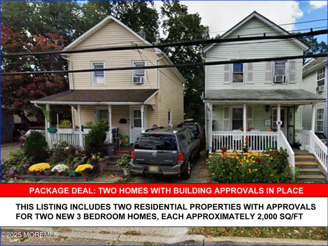 a view of the house with large windows and a table and chairs