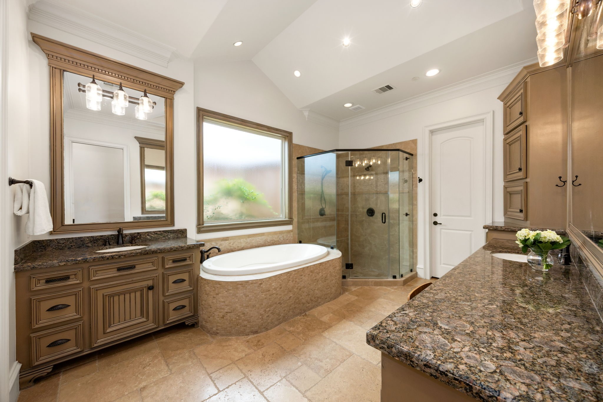 13310 Apple Tree Road Houston, TX 77079 - Photo 14 of 50 Primary bath includes two separate dual sinks, a soaking tub and shower. It also has a coffee bar with a beverage fridge and a large primary closet with built-ins.
