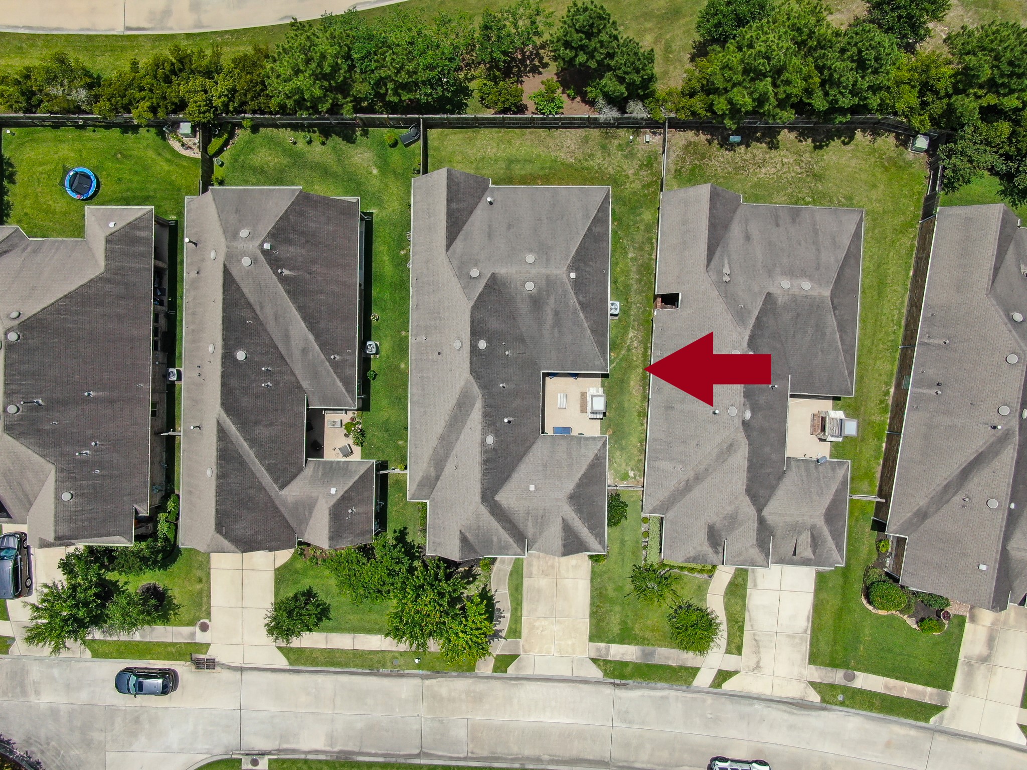 31714 Pierwood Court Spring, TX 77386 - Photo 42 of 49 an aerial view of a house with a garden and lake view