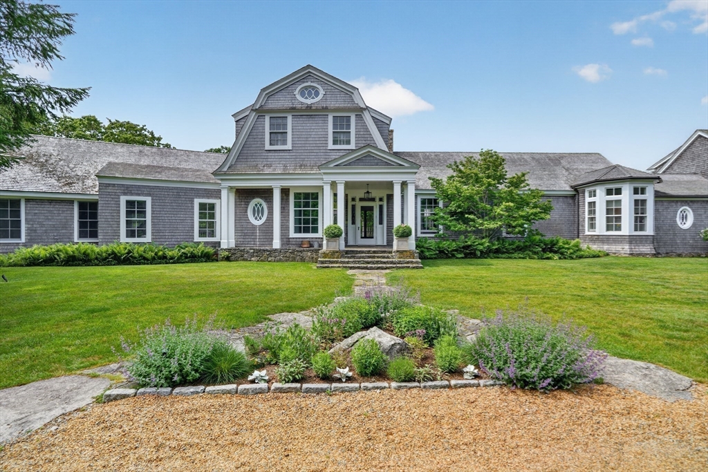 10-12 Boldwater Road Edgartown, MA 02539 - Photo 9 of 41 a front view of a house with a yard