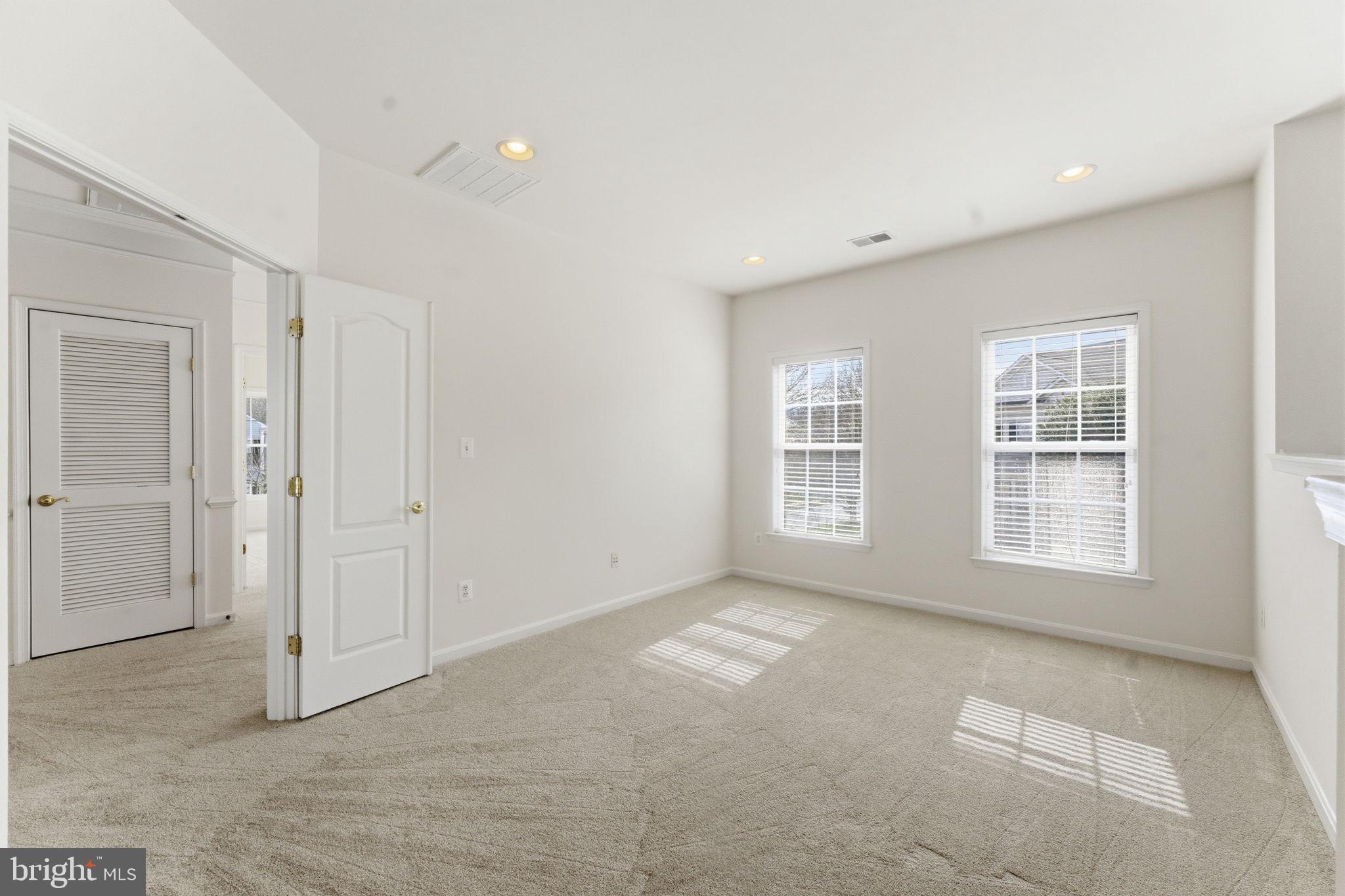 43358 Fullerton Street Ashburn, VA 20147 - Photo 30 of 54 a view of an empty room with a window