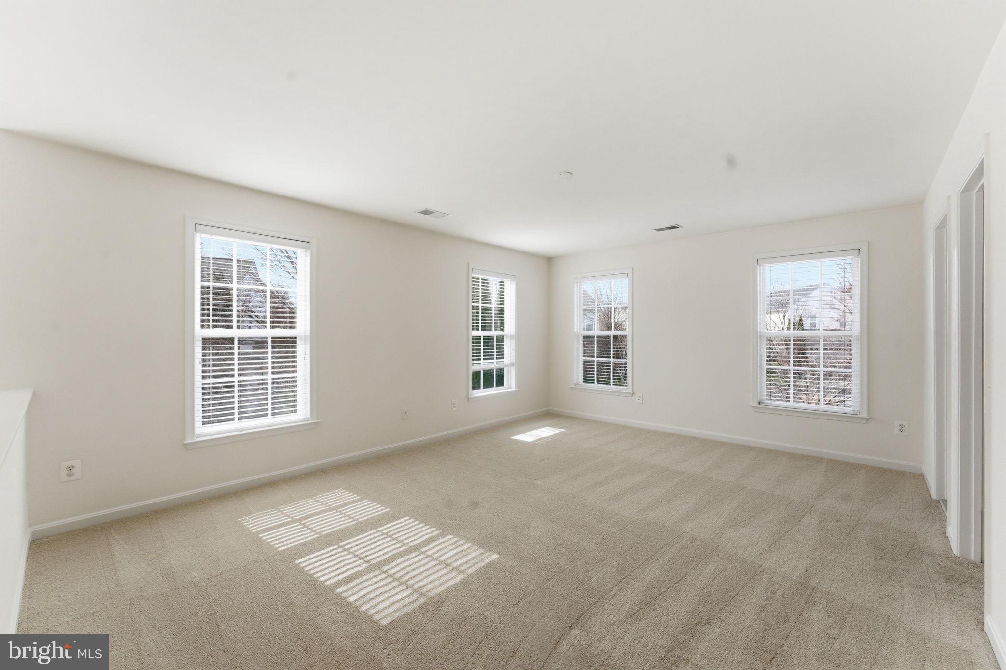 43358 Fullerton Street Ashburn, VA 20147 - Photo 31 of 54 an empty room with windows