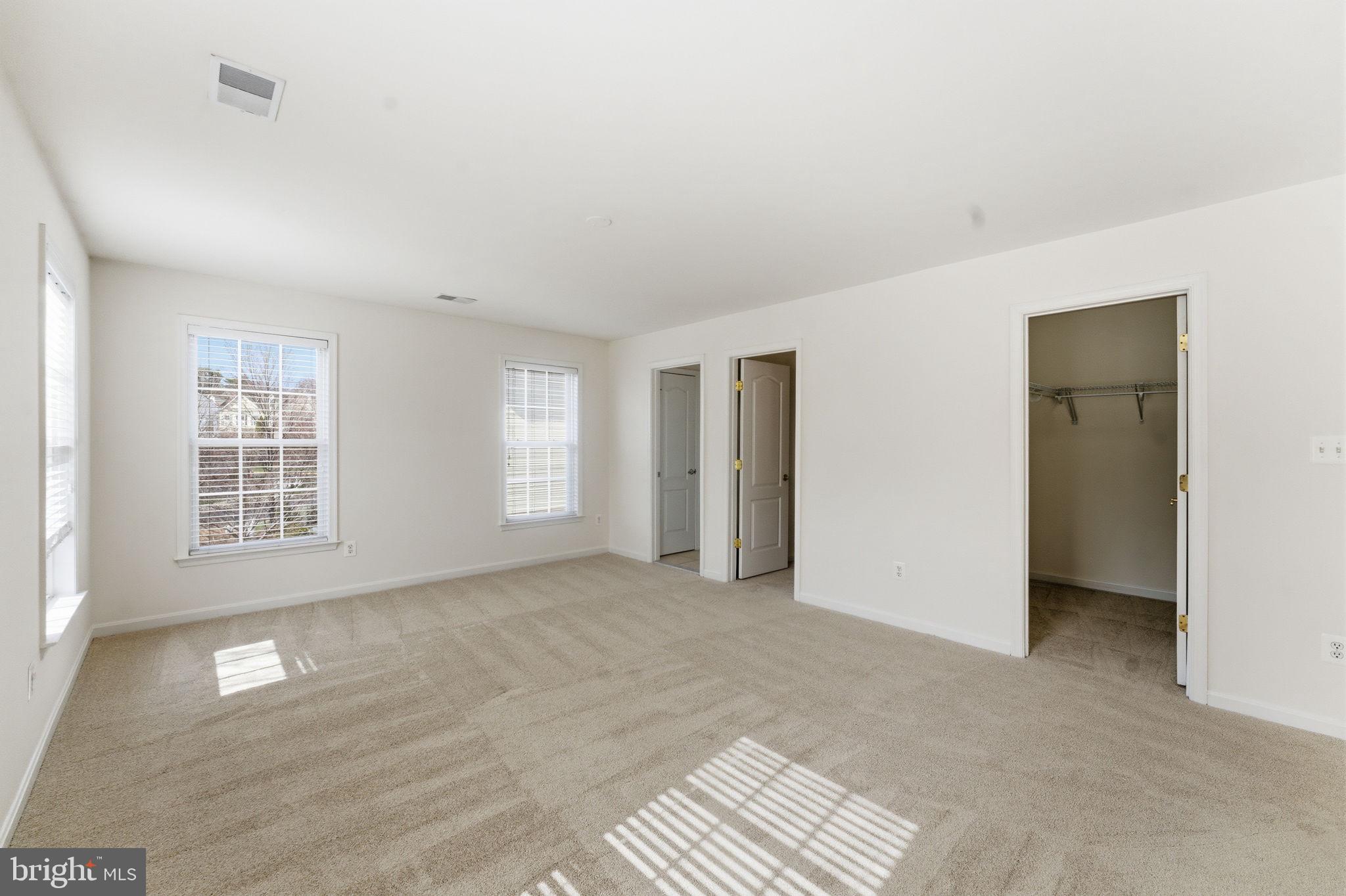 43358 Fullerton Street Ashburn, VA 20147 - Photo 32 of 54 an empty room with windows