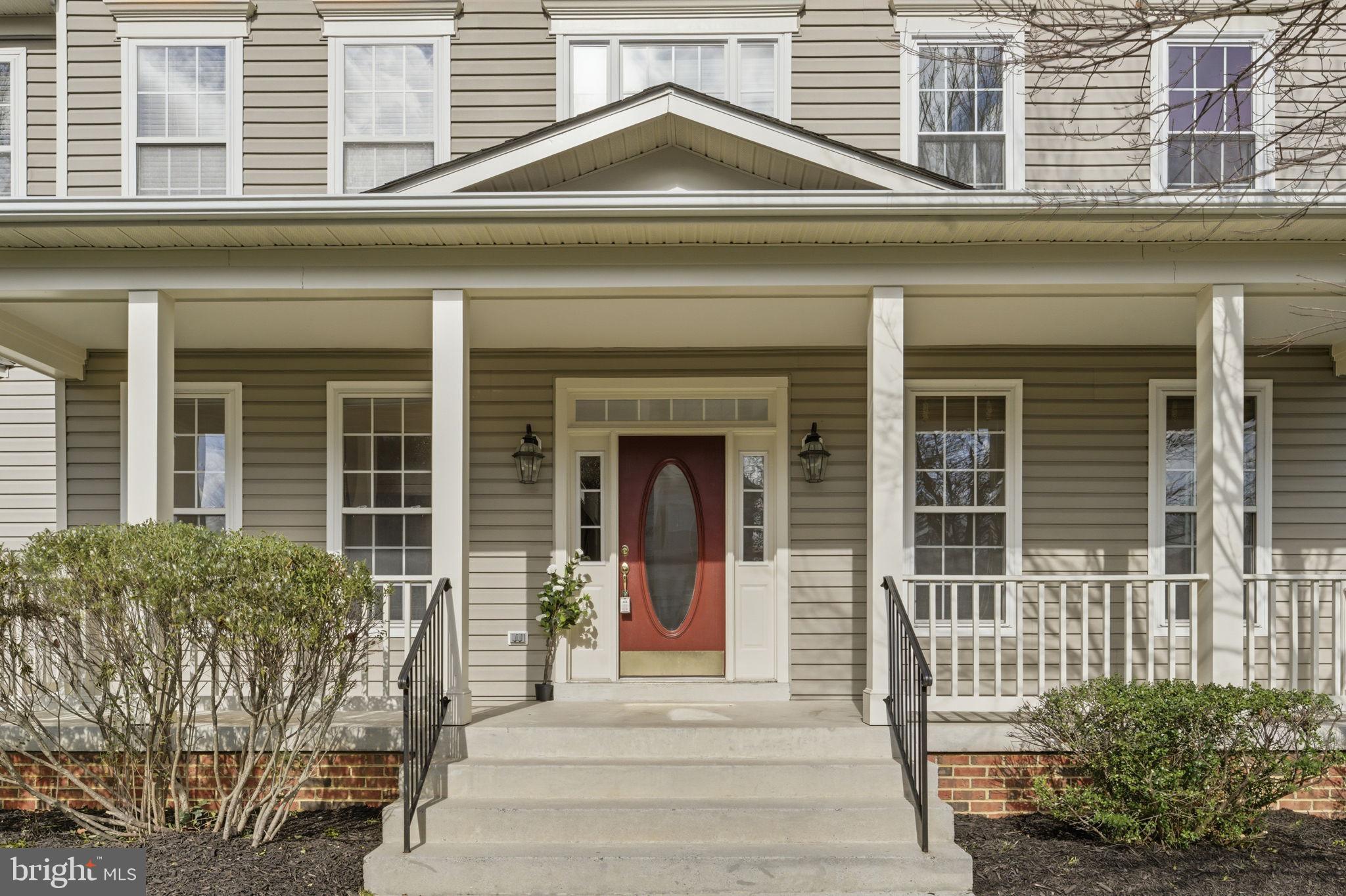 43358 Fullerton Street Ashburn, VA 20147 - Photo 4 of 54 Charming entrance with inviting red door.