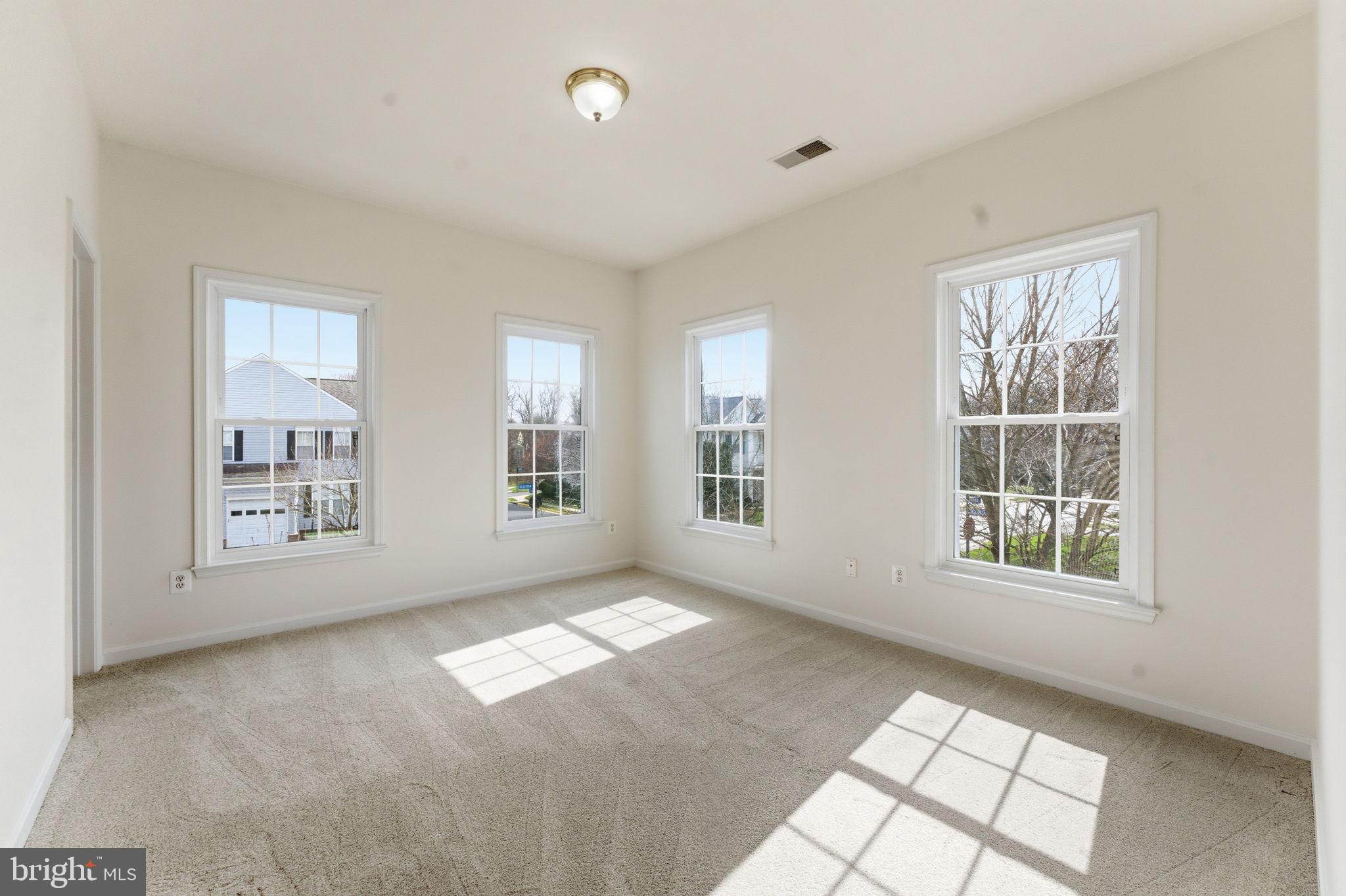 43358 Fullerton Street Ashburn, VA 20147 - Photo 43 of 54 an empty room with windows