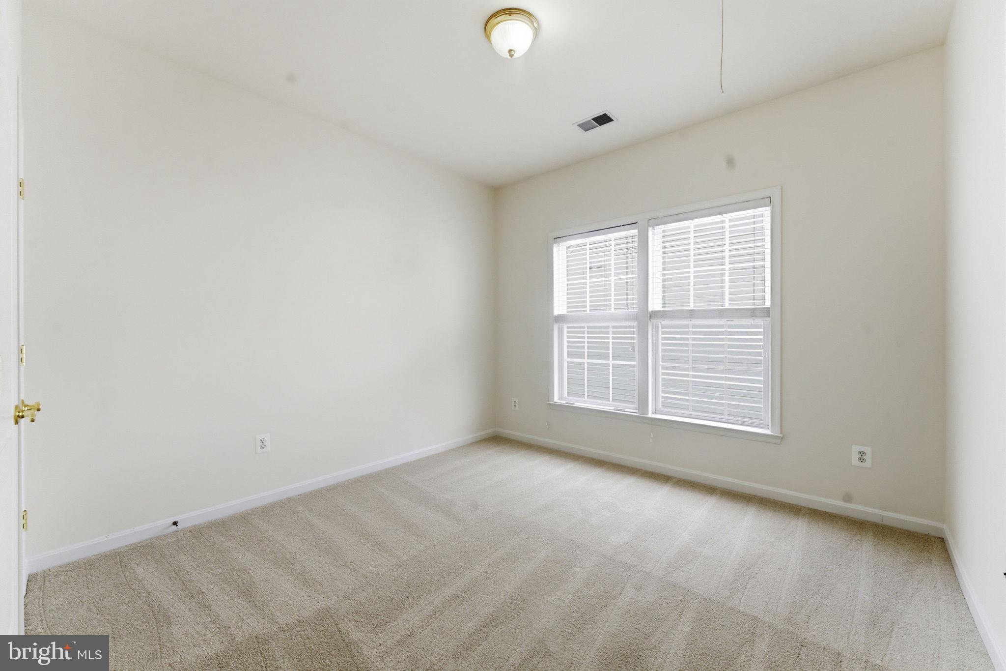 43358 Fullerton Street Ashburn, VA 20147 - Photo 48 of 54 an empty room with a window