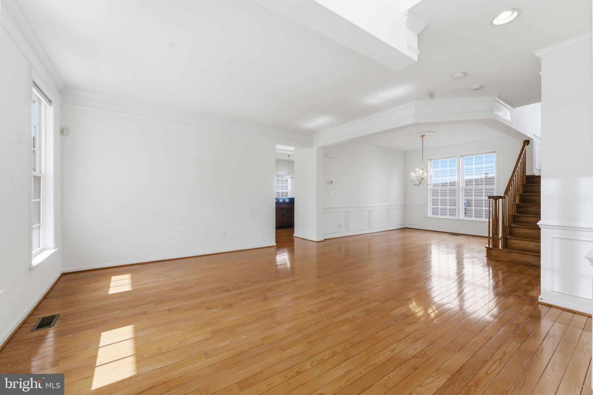 43358 Fullerton Street Ashburn, VA 20147 - Photo 10 of 54 a view of empty room with wooden floor and fan