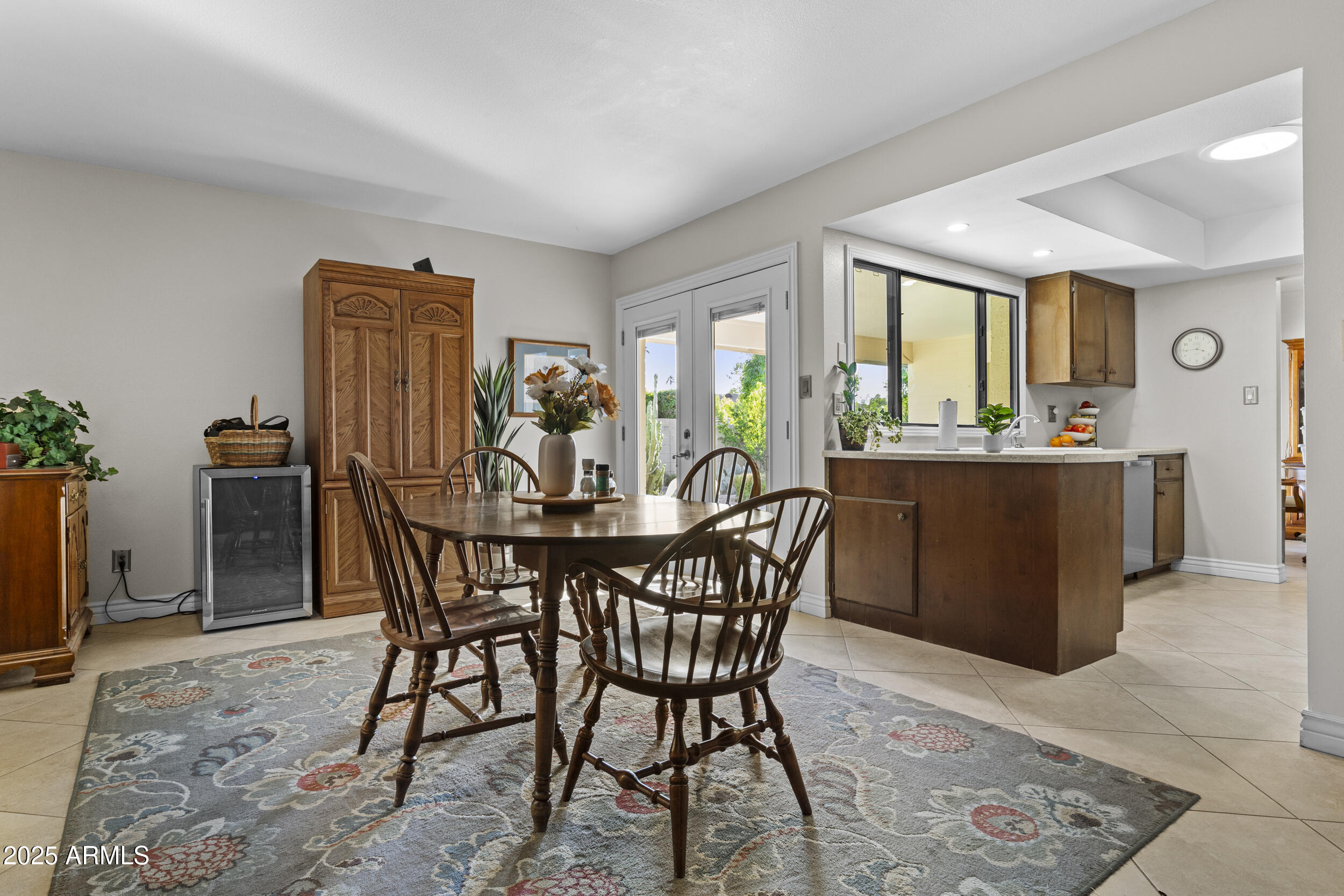 1019 East Watson Drive Tempe, AZ 85283 - Photo 12 of 46 a view of a dining room with furniture and window