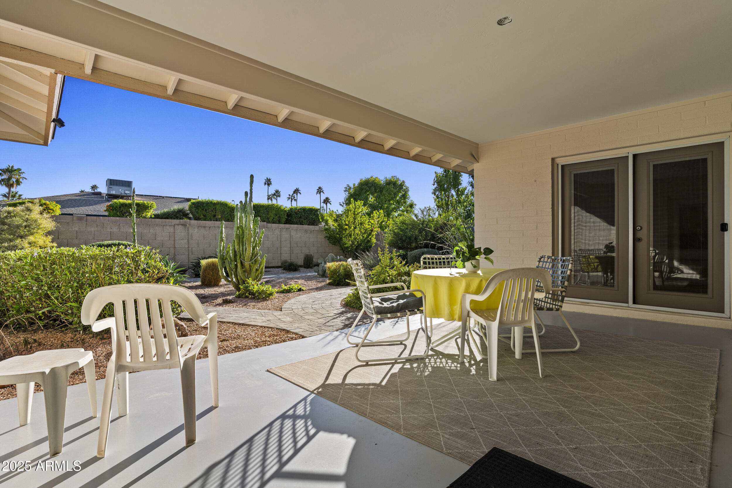 1019 East Watson Drive Tempe, AZ 85283 - Photo 29 of 46 a view of a chairs and table in patio of the house