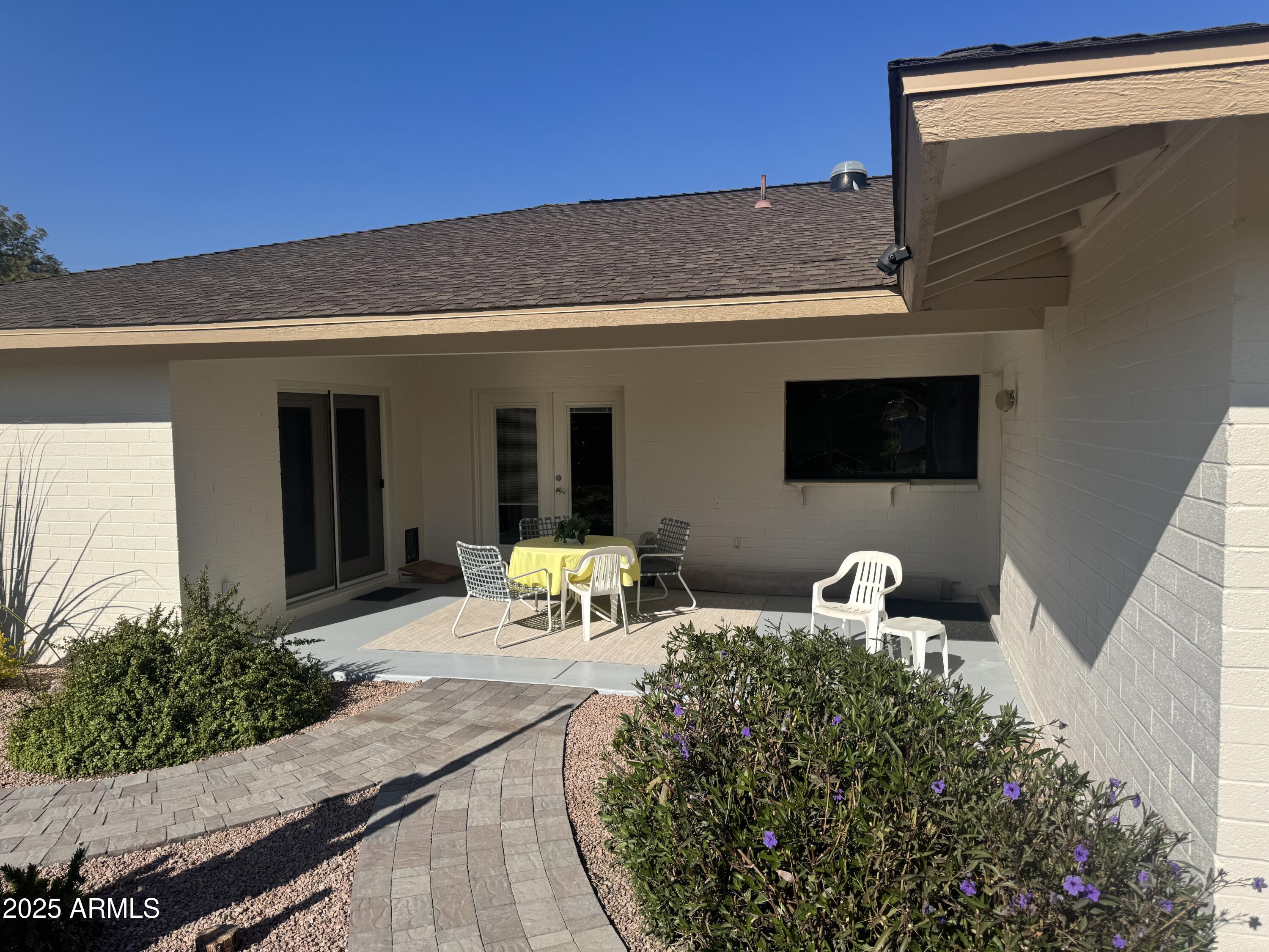 1019 East Watson Drive Tempe, AZ 85283 - Photo 30 of 46 a front view of house with yard outdoor seating and green space
