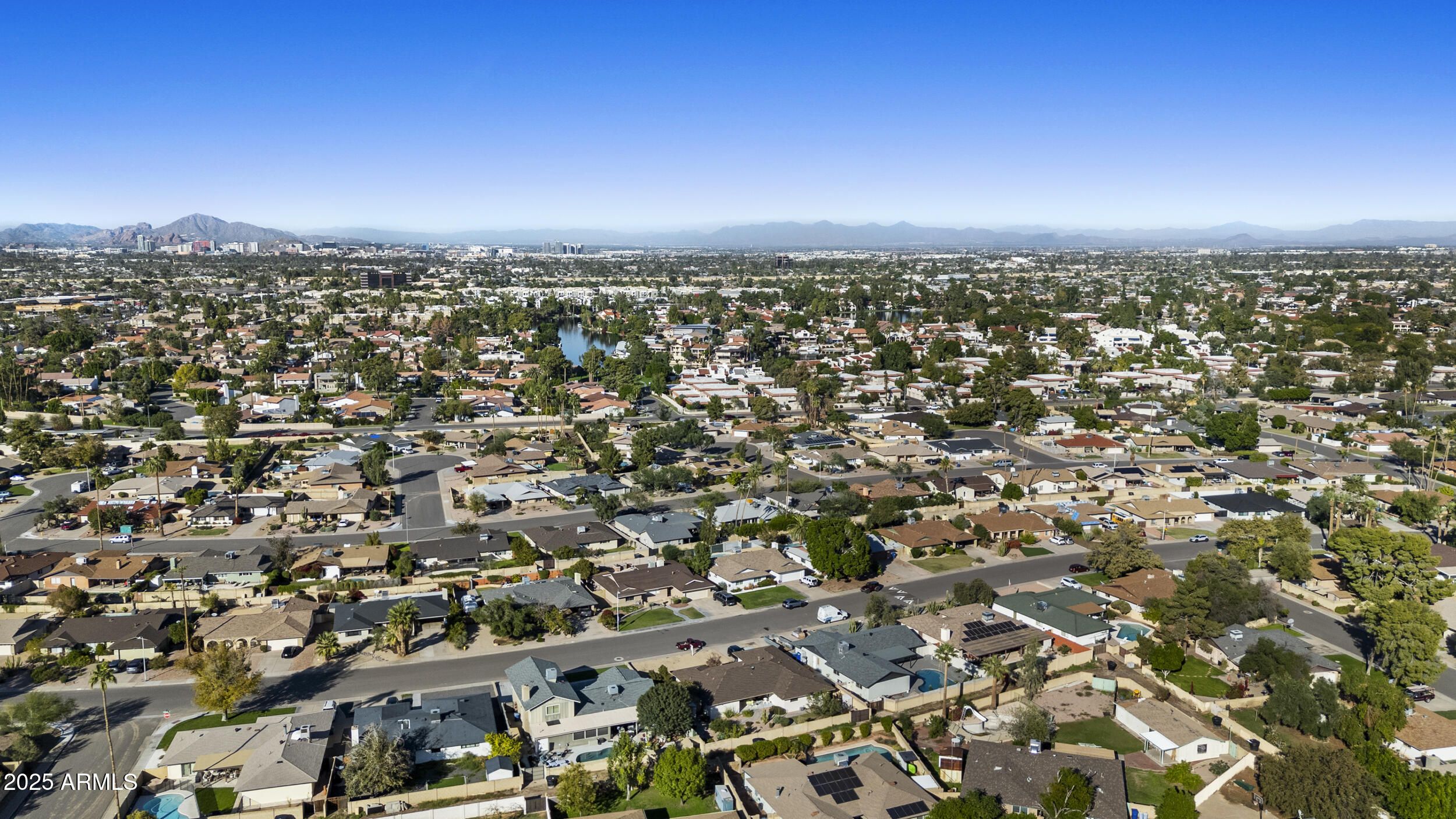 1019 East Watson Drive Tempe, AZ 85283 - Photo 36 of 46 an aerial view of residential building with parking space