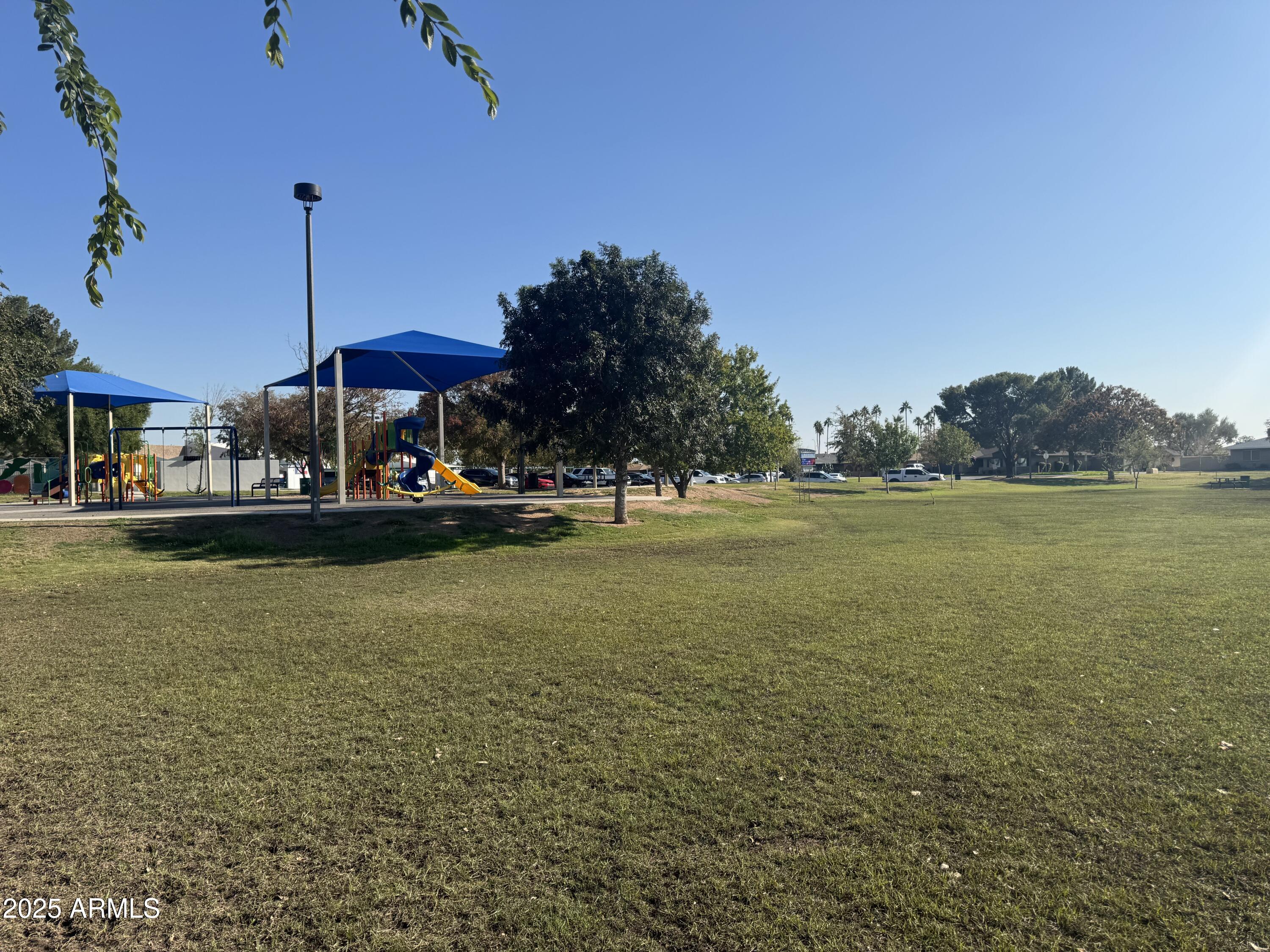 1019 East Watson Drive Tempe, AZ 85283 - Photo 39 of 46 a view of a lake with houses