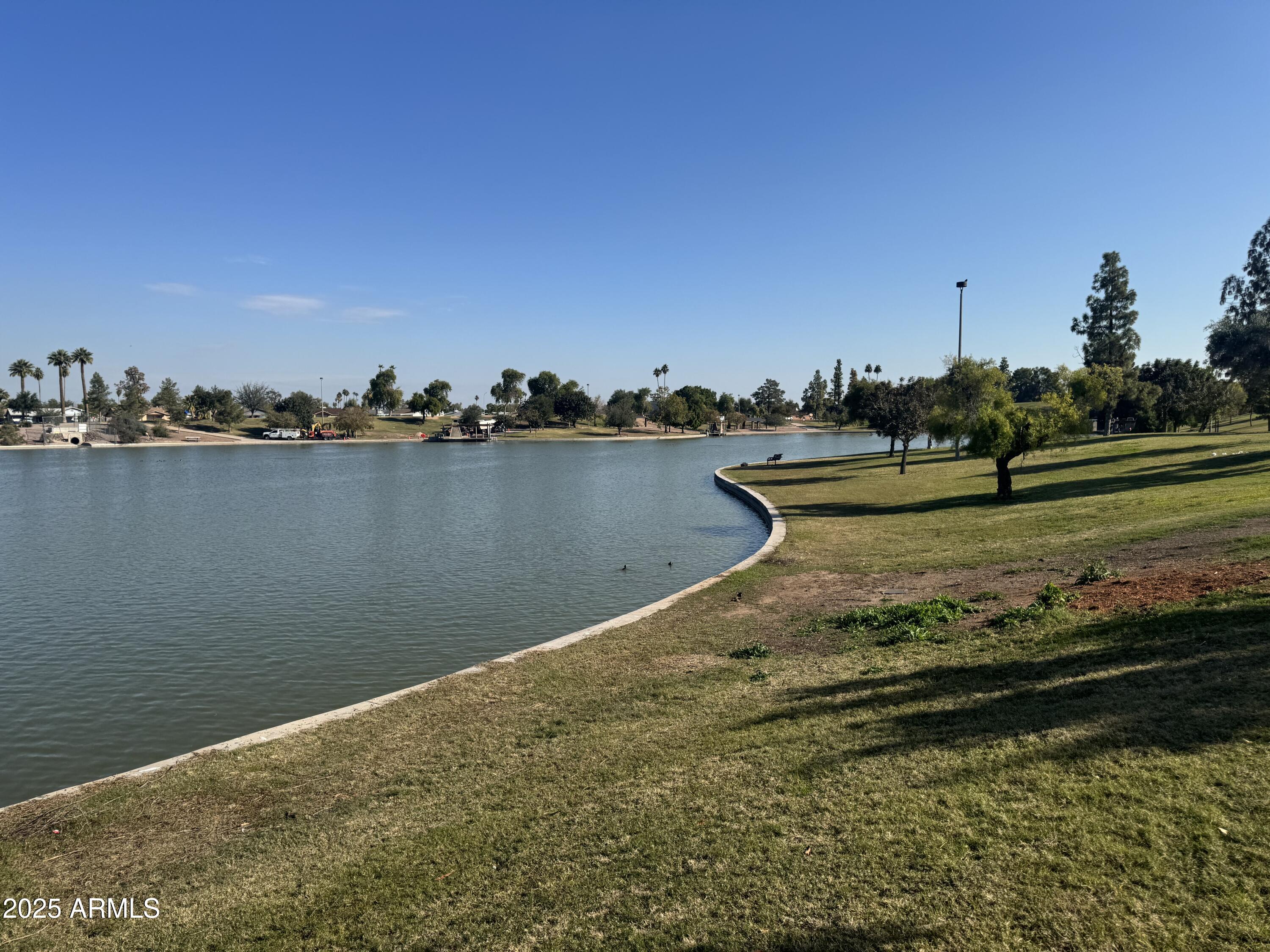 1019 East Watson Drive Tempe, AZ 85283 - Photo 42 of 46 a view of a lake with houses