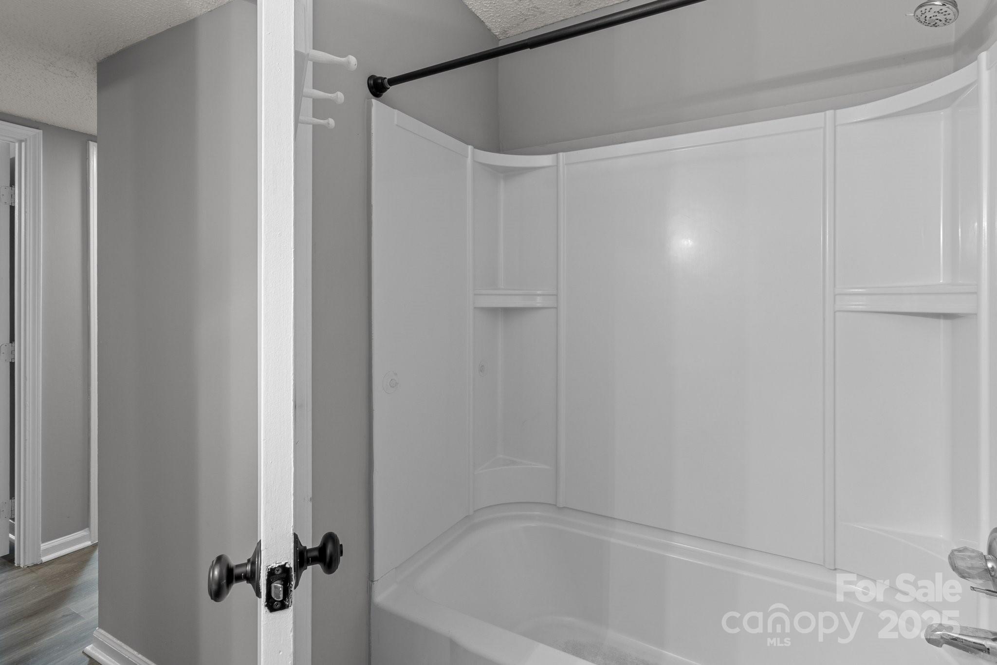 140 Lake Concord Road Northeast, Unit D9 Concord, NC 28025 - Photo 17 of 28 a bathroom with a bathtub