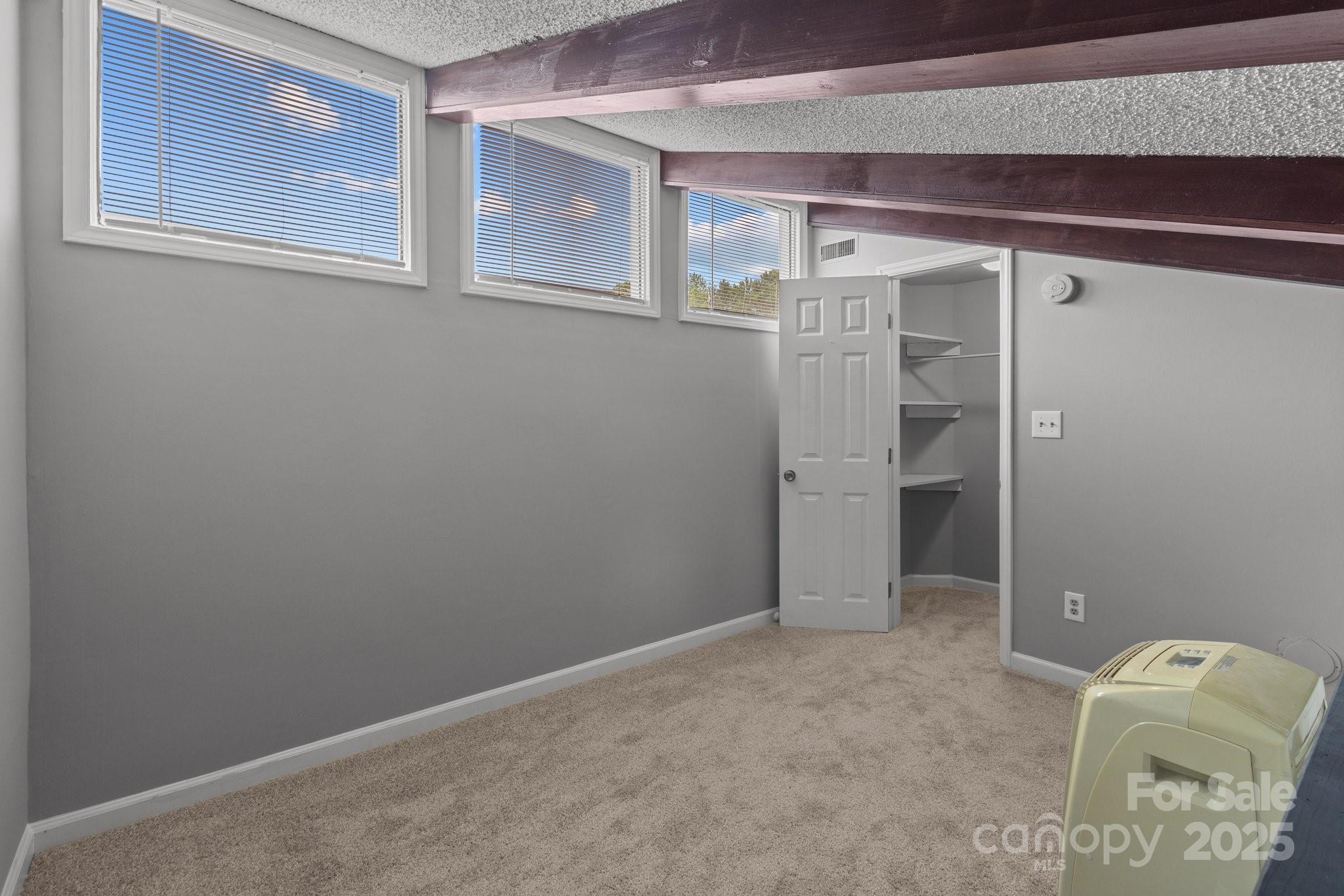 140 Lake Concord Road Northeast, Unit D9 Concord, NC 28025 - Photo 20 of 28 a view of an empty room