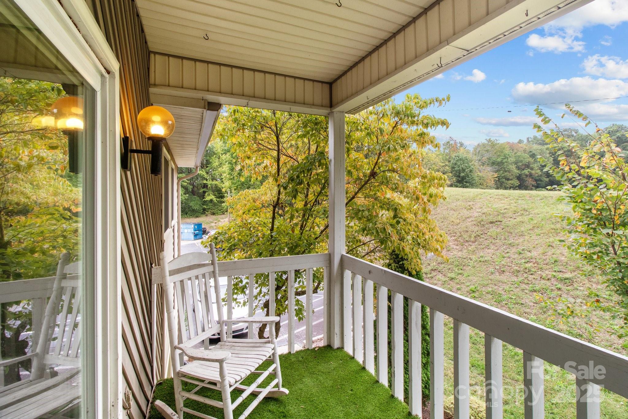 140 Lake Concord Road Northeast, Unit D9 Concord, NC 28025 - Photo 23 of 28 a view of a two chair in the balcony