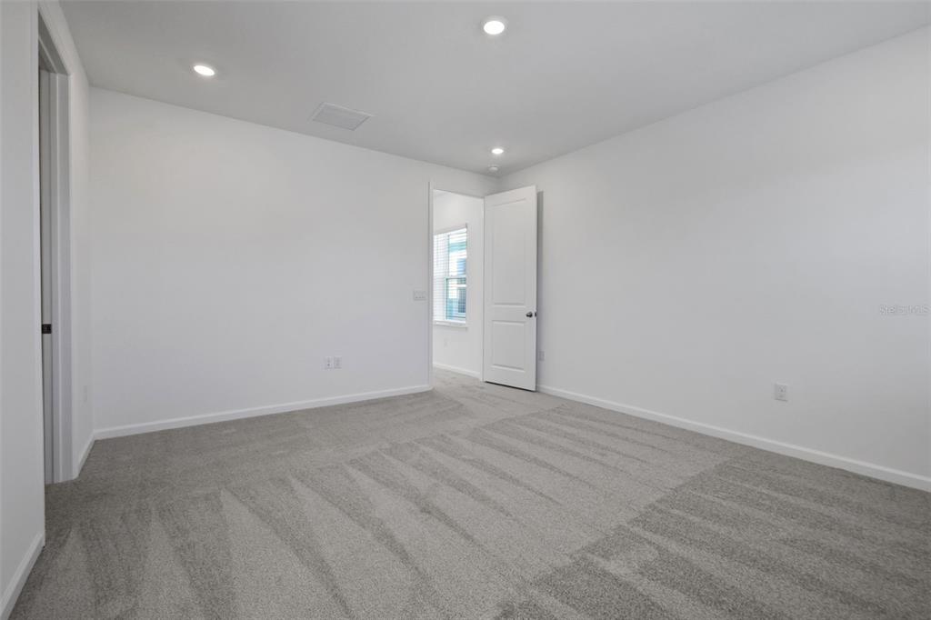 13013 Serene Glade Road Winter Garden, FL 34787 - Photo 11 of 57 a view of an empty room