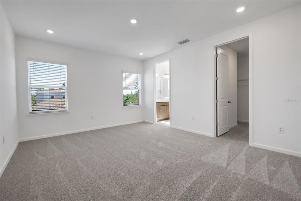 13013 Serene Glade Road Winter Garden, FL 34787 - Photo 13 of 57 an empty room with windows and closet