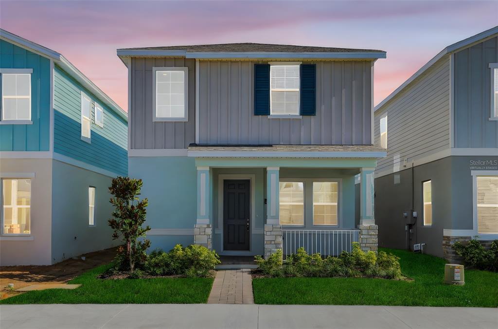 13013 Serene Glade Road Winter Garden, FL 34787 - Photo 2 of 57 a front view of a house with a yard