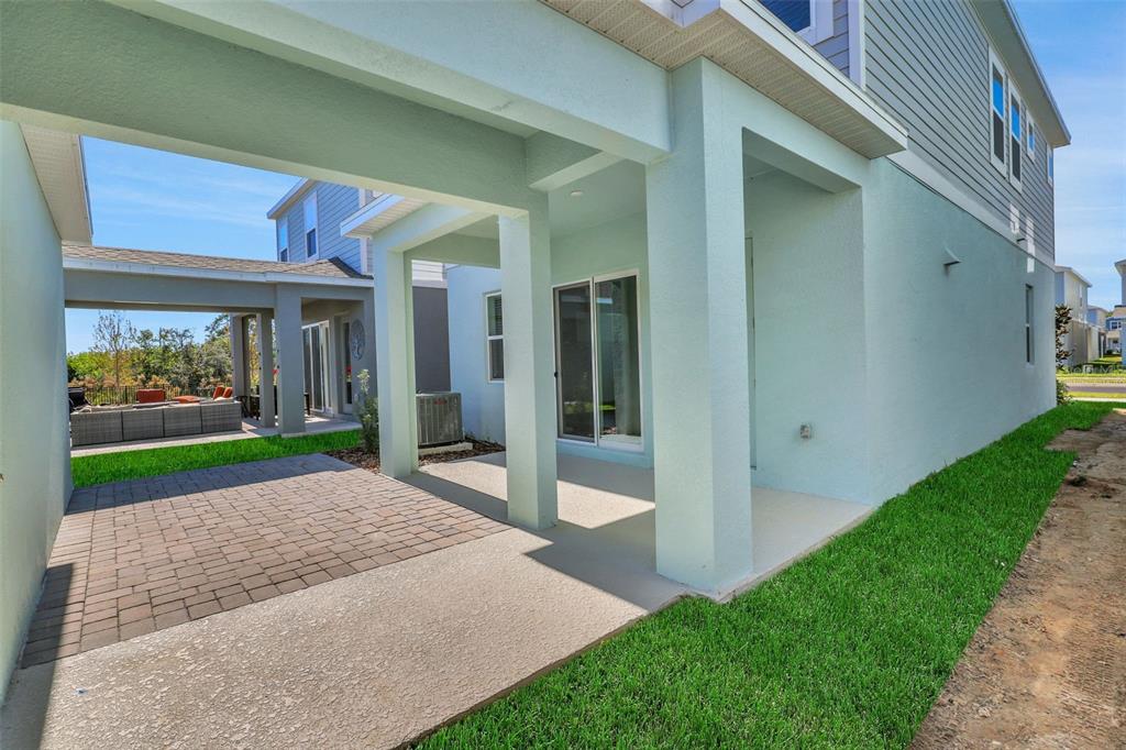13013 Serene Glade Road Winter Garden, FL 34787 - Photo 29 of 57 a view of a porch with a yard