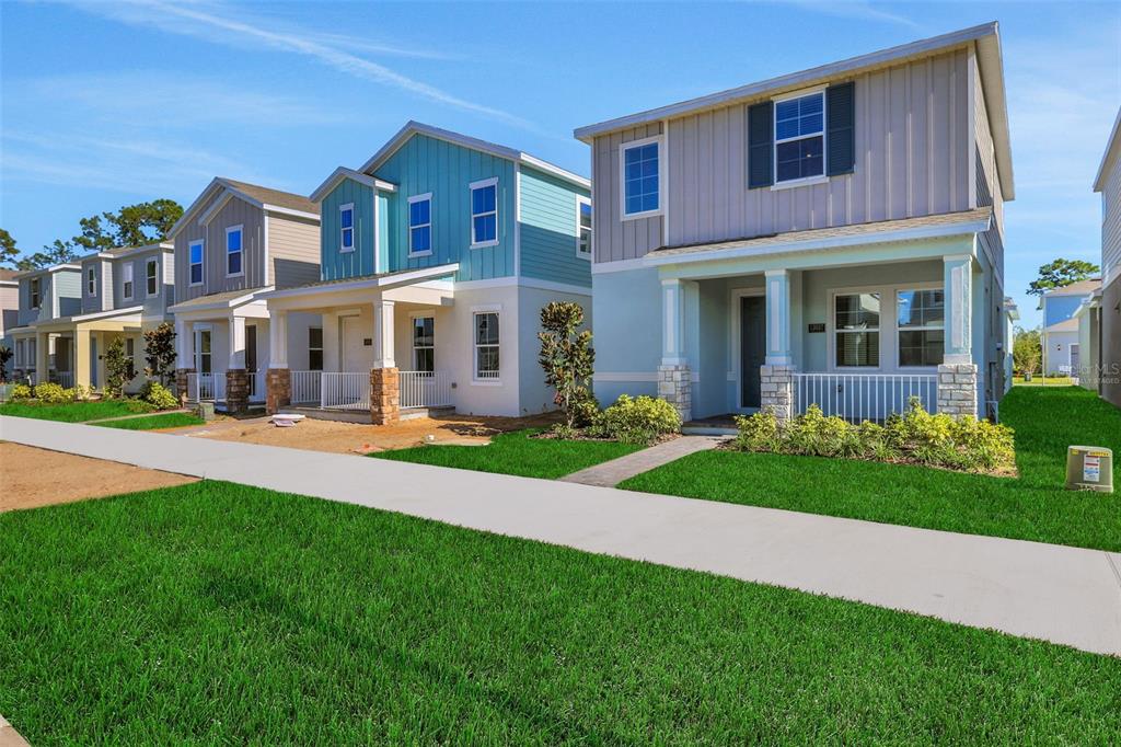 13013 Serene Glade Road Winter Garden, FL 34787 - Photo 30 of 57 a view of a brick building with a yard