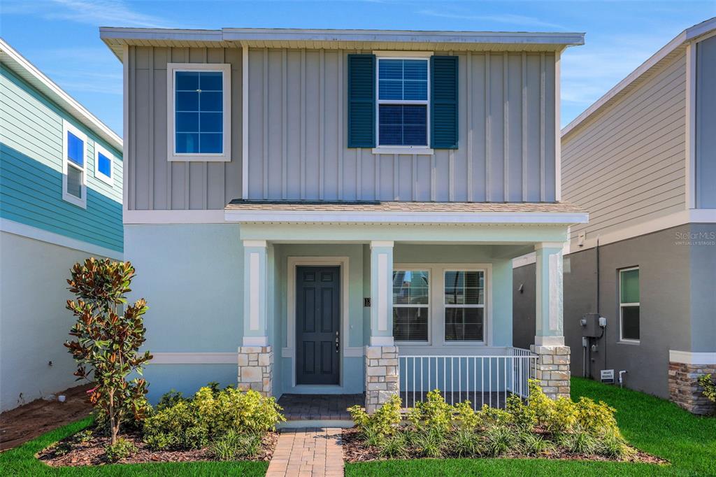 13013 Serene Glade Road Winter Garden, FL 34787 - Photo 3 of 57 a front view of a house with a yard